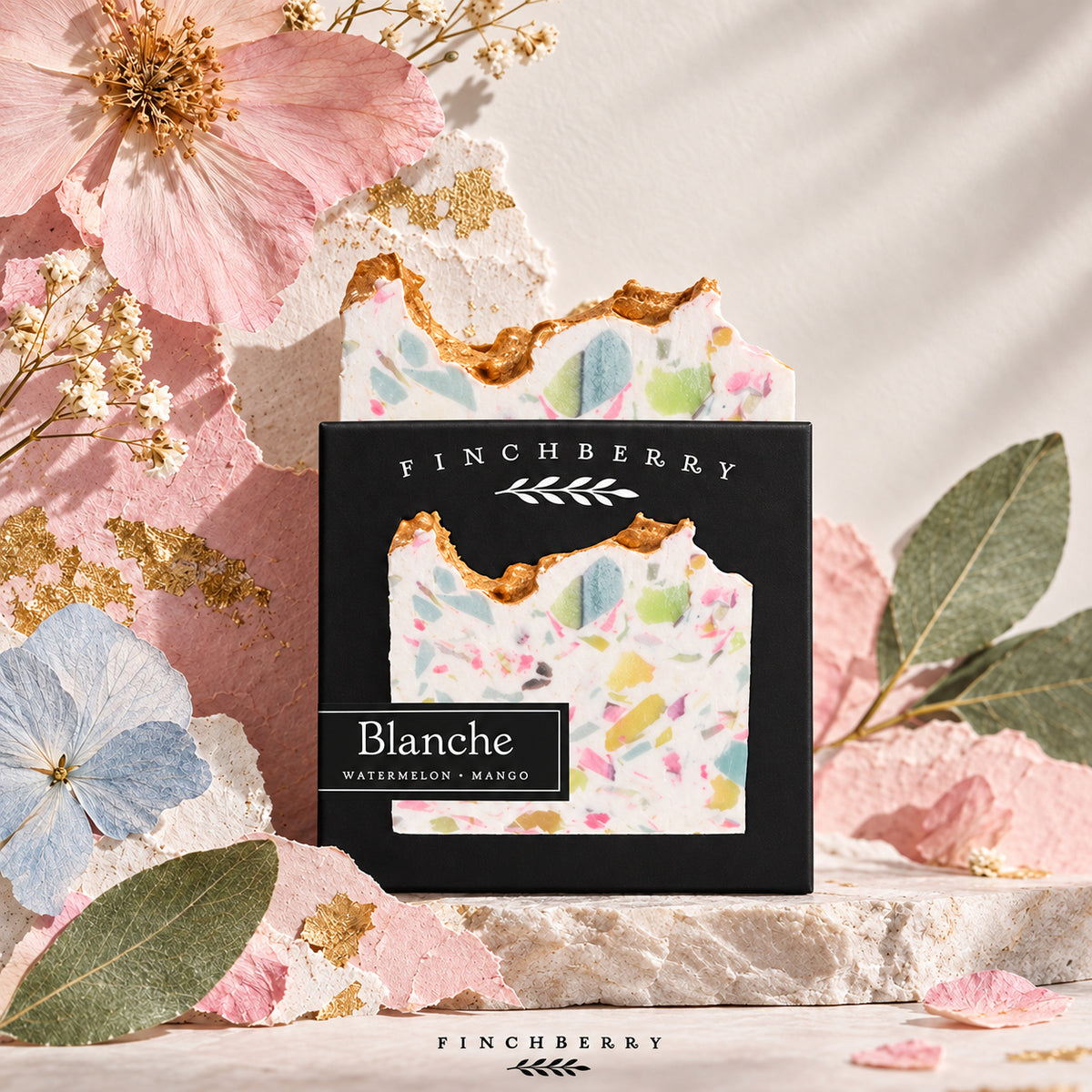 Blanche soap with pressed flowers and gold-flecked handmade paper