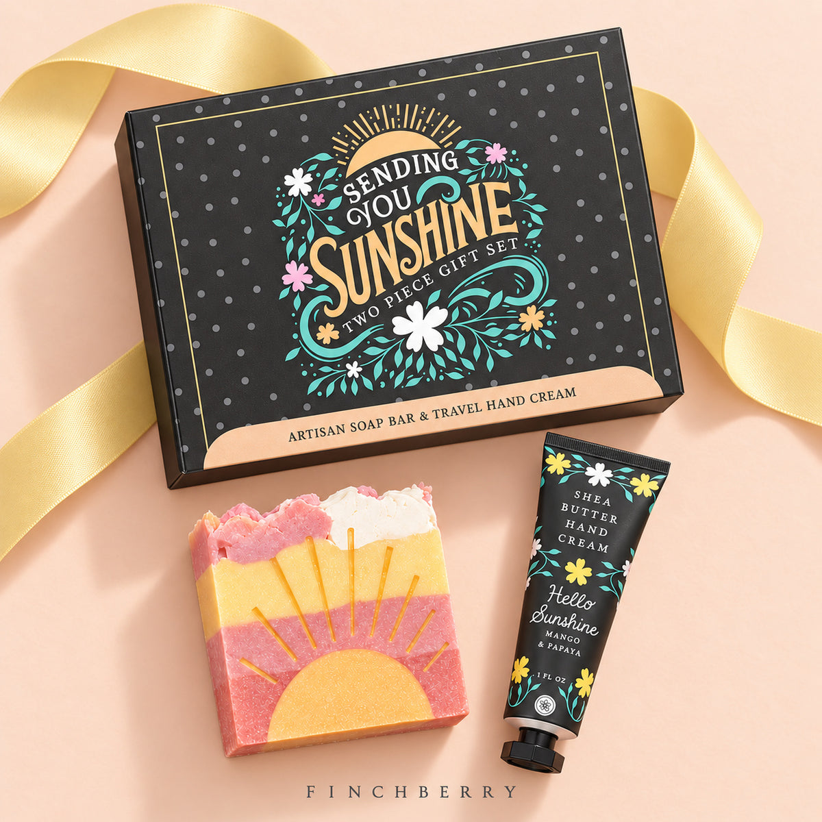 Sending You Sunshine gift set with soft peach backdrop and pale yellow ribbon