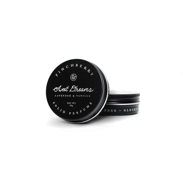 Sweet Dreams Solid Perfume in black circular tin container with white lettering